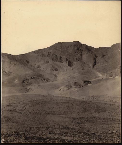 View of the Italian Archaeological Mission’s camp in the Valley of the Queens near the remains of the Coptic convent of Deir Rumi, in 1903. A brick shelter and five conical tents are visible. Schiaparelli excavations 