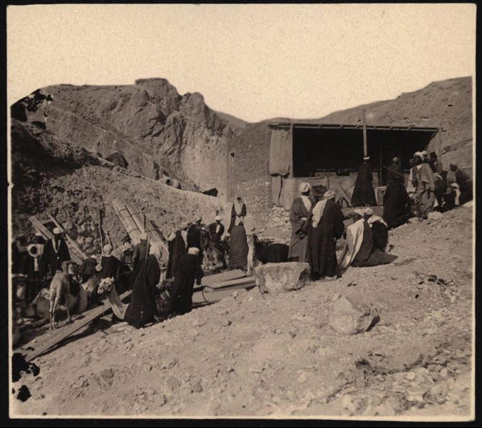 View of the Italian Archaeological Mission’s camp in the Valley of the Queens near the remains of the Coptic convent of Deir Rumi, in 1903. A brick shelter and five conical tents are visible. Schiaparelli excavations 
