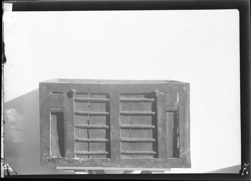 Unidentifiable burial shaft. Quadrangular sarcophagus containing a mummy in a crouched position. Schiaparelli or Farina excavations. 