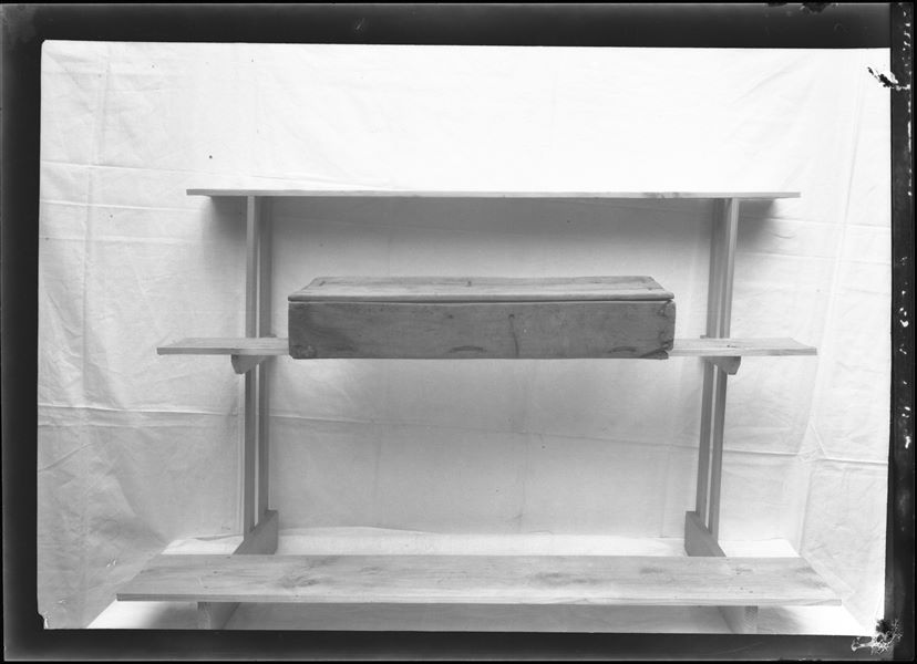 ​Wooden chest containing five rolls of administrative papyri, found in 1935 in the north area of the northern hill, in an anonymous shaft tomb. The photograph was taken in the Turin Museum while restoring the papyri which were later returned to the Cairo Museum. Farina excavations. 