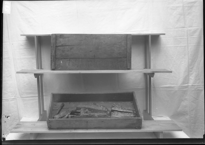 ​Wooden chest containing five rolls of administrative papyri, found in 1935 in the north area of the northern hill, in an anonymous shaft tomb. The photograph was taken in the Turin Museum while restoring the papyri which were later returned to the Cairo Museum. Farina excavations. 
