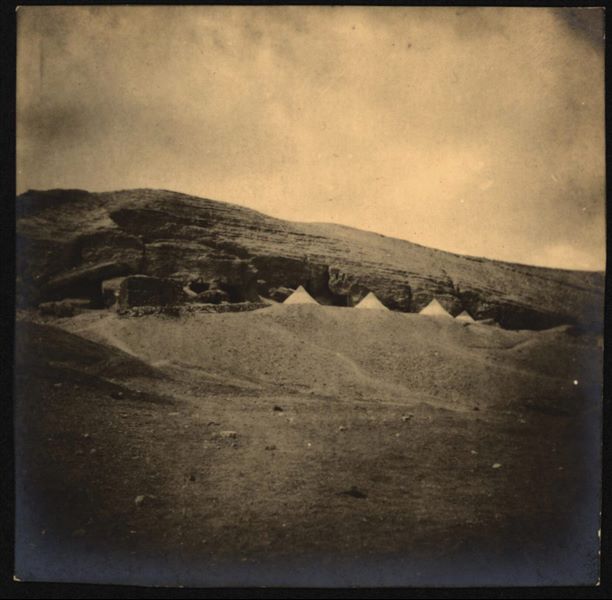 Italian Mission’s camp on the slopes of the northern hill. In addition to the conical tents, on the left there is the small brick building, which was used for housing the discovered antiquities and developing photographs. Schiaparelli excavations.