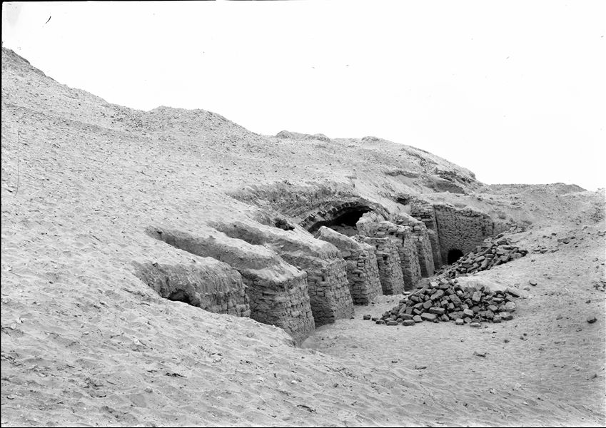 Brick structure with a portico at the foot of the hill, east of the village of Abu Hummas, before excavations began. The tomb (now completely lost) could be attributed to Iqer, a local dignitary, some of whose artefacts are preserved in Museo Egizio. Schiaparelli excavations. 