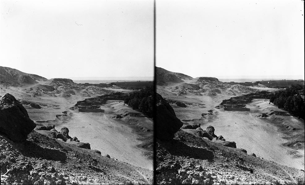 Northern area of the first hill prior to the start of excavations. In the background, the modern village of Naga el-Gherira, in the foreground the houses of Abu Hummas. Farina excavations. 
