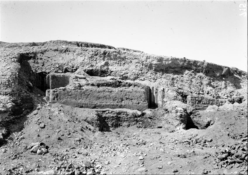 Northern necropolis. Remains of the plastered mud-brick structures from the mastaba of Perim. On the right, a false-door is visible. The tomb consisted of ​​several burial shafts with small rooms. The contents, which were found intact, were severely damaged by termites that completely destroyed the sarcophagi and the wooden grave goods.  Schiaparelli excavations. 