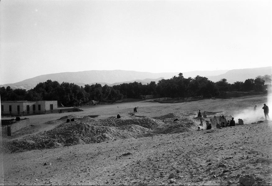 Excavations near the last section of houses from Abu Hummas. Giovanni Marro is visible on the far right and the camp’s tents can be seen among the trees. Farina excavations. 