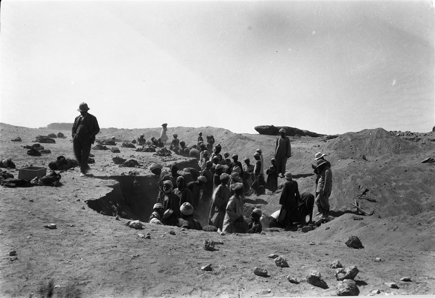 Northern necropolis. Systematic excavation searching for the ancient stratigraphic layer. This picture shows all the members of the mission: on the left Giovanni Marro, on the right Giulio Farina and Michelangelo Pizzio who is wearing a white helmet. Farina excavations. 