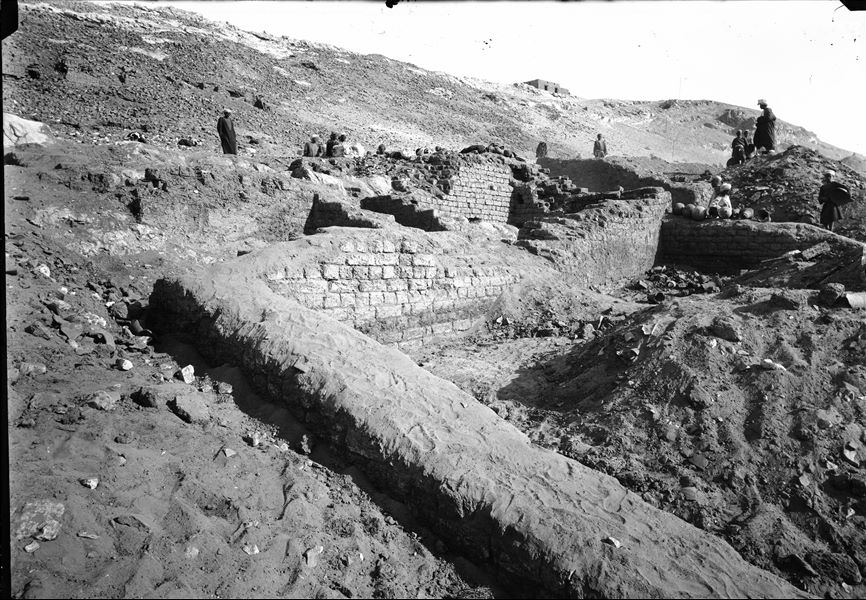 Excavations along the slopes on the western side of the southern hill. The numerous ceramics, some of considerable size, suggest the presence of food storage houses. Schiaparelli excavations. 