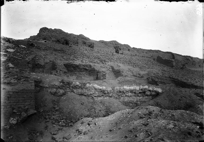 View of the upper part of the southern hill, western side. Notable are the impressive set of structures with buildings and walkways that led to the top of the hill. Schiaparelli excavations. 