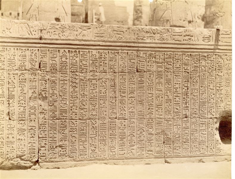 The image shows part of the texts that decorate the external wall of the hypostyle hall from the Temple of Sobek and Haroeris at Kom Ombo. 