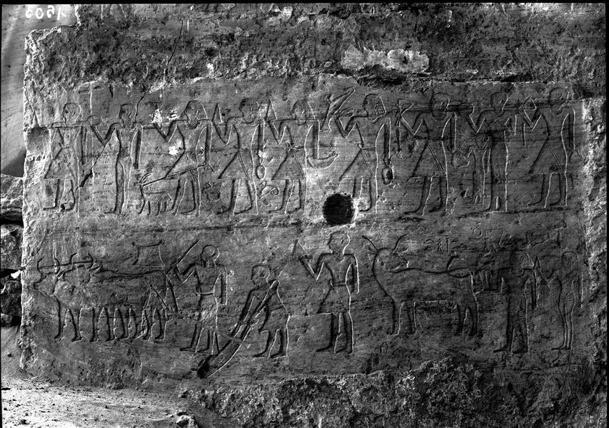 Excavation of the tomb of Khunes (QH 34h), east wall of the tomb. Schiaparelli excavations.