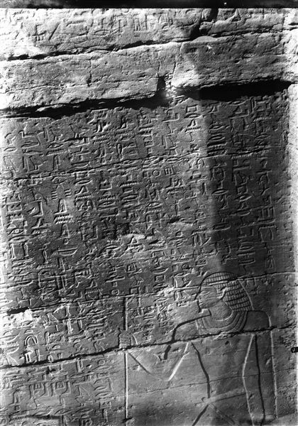 Right wall of the facade of the tomb of Herkhuf (QH 34n). In the text, Herkhuf recounts his three expeditions to the south. Schiaparelli excavations.