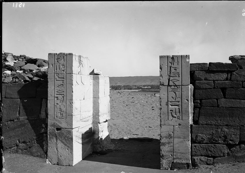 View of the courtyard entrance of the tomb of Sarenput I (QH 36), in the direction of the Nile. In the background, the city of Aswan. Schiaparelli excavations.