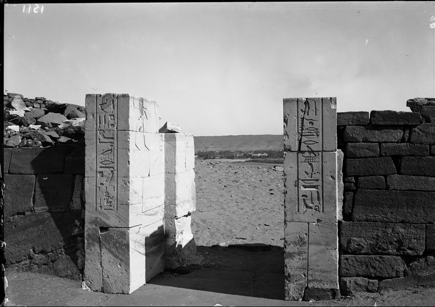 View of the courtyard entrance of the tomb of Sarenput I (QH 36), in the direction of the Nile. In the background, the city of Aswan. Schiaparelli excavations.