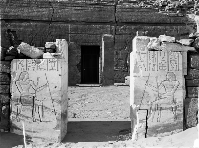 View of the entrance to the courtyard of the tomb of Sarenput I (QH 36), followed by the entrance to the rock-cut chambers. Schiaparelli excavations.