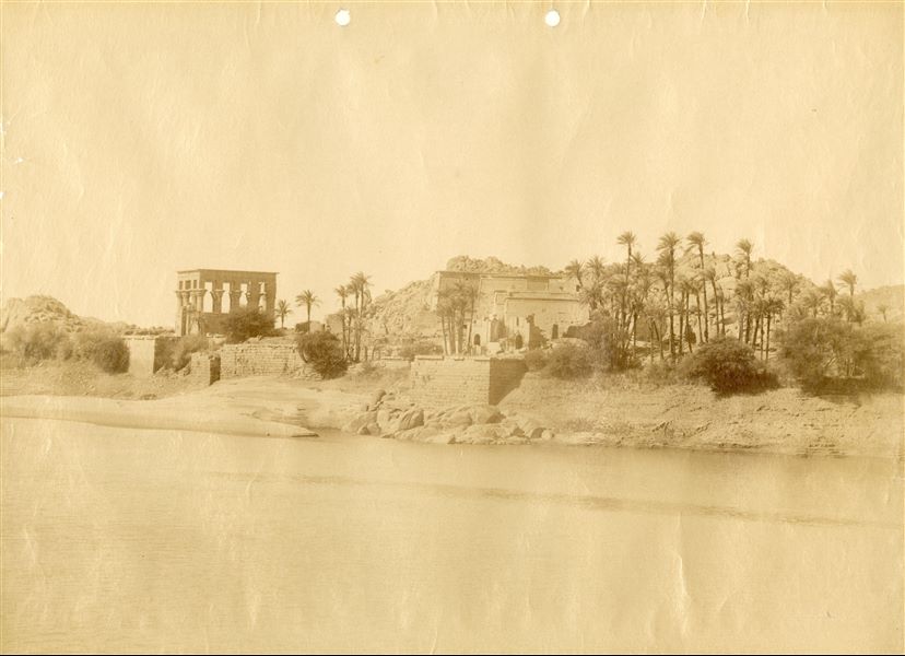 View of the island of Philae with the temple complex dedicated to the goddess Isis. On the left is the Kiosk erected by Emperor Trajan. 