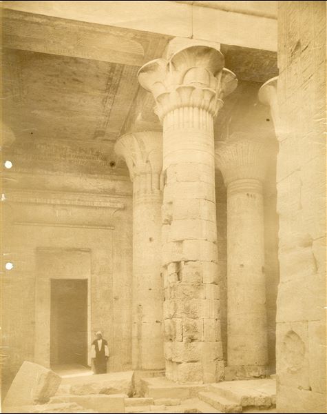 Interior of the Temple of Isis at Philae. On the back wall is a graffito written in Italian, which reads “GREGORIO XVI F.R. PEGLI AUSPICI DEGLI EMINENTISSIMI PP. GAMBERINI E TOSTI FIN QUI LA SPEDIZIONE ROMANA SUL BORDO LA FEDELTA’ [CHE DAL TEVERE A] QUESTI SCOGLI [IL 21 GENNAIO 1841 APPRODAVA]”. English translation: “GREGORY XVI F.R. UNDER THE AUSPICES OF THE MOST EMINENT PP. GAMBERINI AND TOSTI SO FAR THE ROMAN EXPEDITION ON BOARD THE FAITHFUL [WHICH FROM THE TIBER TO] THESE ROCKS [ON 21 JANUARY 1841 LANDED]”. 