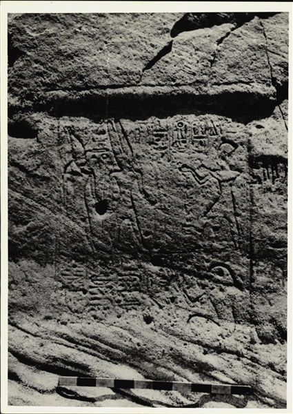 Photograph of a wall from the rock-cut chapel of Ellesiya in its original location in Nubia, shortly before the Nile waters would begin to rise due to the construction of the Aswan Dam, which would flood the area. Photograph taken in the mid-1960s, shortly before the rock-cut chapel was moved.