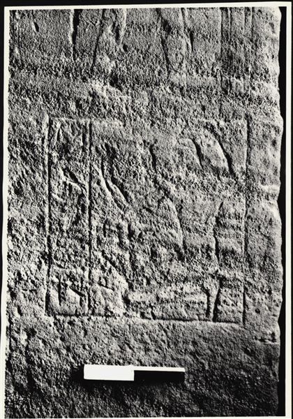 Photograph of a wall from the rock-cut chapel of Ellesiya in its original location in Nubia, shortly before the Nile waters would begin to rise due to the construction of the Aswan Dam, which would flood the area. Photograph taken in the mid-1960s, shortly before the rock-cut chapel was moved.