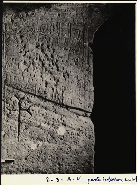 Two of the 66 blocks from the rock-cut chapel of Ellesiya. Scene on the back left wall of the transverse hall (opening to the right of the chapel), depicting the god Amun-Re seated on a throne in front of a pile of offerings. Below the wall scene, a Christian cross is visible.  