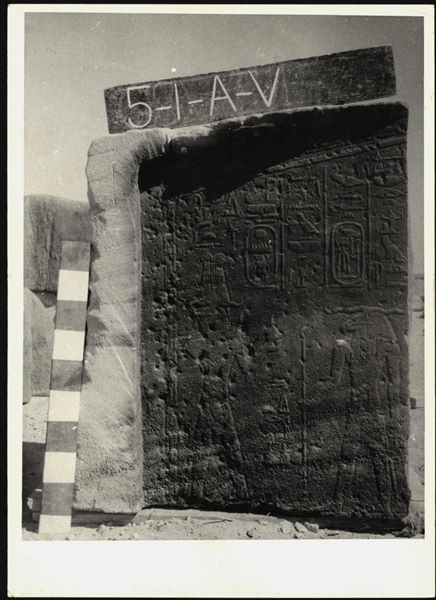 Storage at Wadi es-Sebua, one of the 66 blocks from the rock-cut chapel of Ellesiya stored waiting to be transported to Turin, after the United Arab Republic decided to gift the rock-cut chapel to the Italian Republic. Wall scene from the left side of the transverse hall showing Tuthmosis III and the god Khnum. 