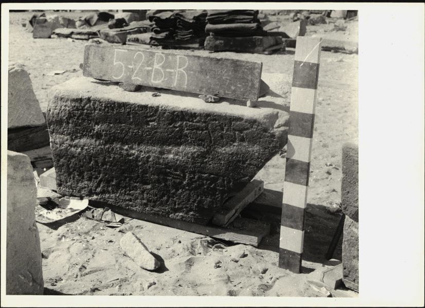 Storage at Wadi es-Sebua, one of the 66 blocks from the rock-cut chapel of Ellesiya stored waiting to be transported to Turin, after the United Arab Republic decided to gift the rock-cut chapel to the Italian Republic. Lower register from the left wall of the chapel, where there are some inscriptions. 