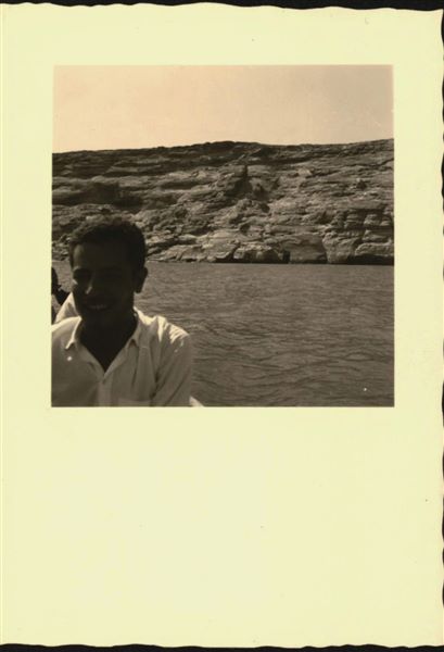 Photograph taken in the direction of the rock-cut rock-cut chapel of Ellesiya that can be seen in the background. In a short time, the rock-cut chapel would have been submerged by Lake Nasser, which had already formed and was full. Photograph taken from a boat.