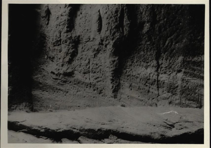 Photograph of an interior wall from the rock-cut chapel of Ellesiya in its original location in Nubia, shortly before the Nile waters would begin to rise due to the construction of the Aswan Dam, which would flood the area. Photograph taken in the mid-1960s, shortly before the rock-cut chapel was moved. Note the original floor, which was not saved.