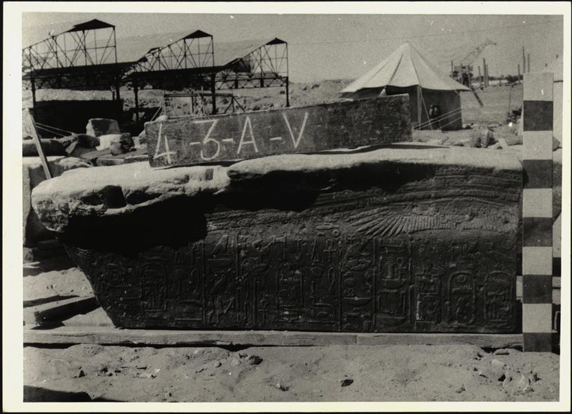 Storage at Wadi es-Sebua, one of the 66 blocks from the rock-cut chapel of Ellesiya stored waiting to be transported to Turin, after the United Arab Republic decided to gift the rock-cut chapel to the Italian Republic. Upper register from the right wall of the transverse hall, showing hieroglyphic inscriptions. 