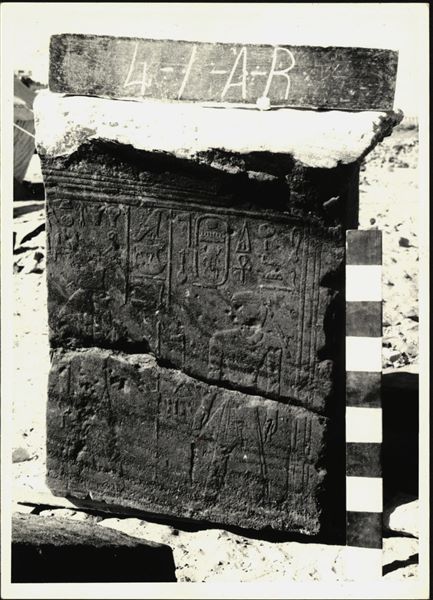 Storage at Wadi es-Sebua, one of the 66 blocks from the rock-cut chapel of Ellesiya stored waiting to be transported to Turin, after the United Arab Republic decided to gift the rock-cut chapel to the Italian Republic. Right wall from the chapel, depicting Horus on the left and Tuthmosis III on the right. 