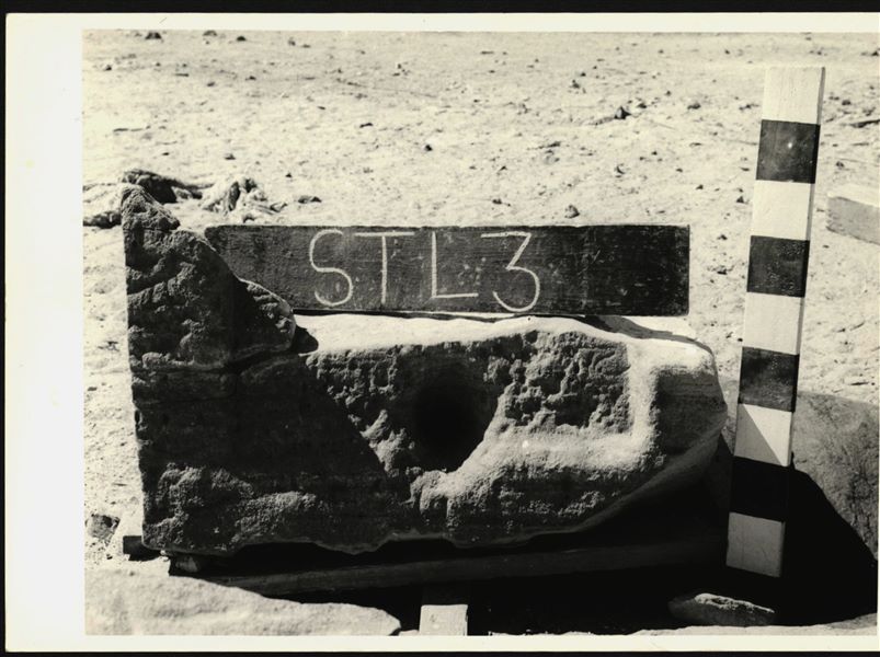 Storage at Wadi es-Sebua, one of the 66 blocks from the rock-cut chapel of Ellesiya stored waiting to be transported to Turin, after the United Arab Republic decided to gift the rock-cut chapel to the Italian Republic. Lower block of one of the stelae carved on the left side of the rock-cut chapels’ external façade. 