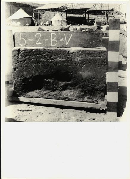 Storage at Wadi es-Sebua, one of the 66 blocks from the rock-cut chapel of Ellesiya stored waiting to be transported to Turin, after the United Arab Republic decided to gift the rock-cut chapel to the Italian Republic. Lower block of the left wall of the transverse hall. 