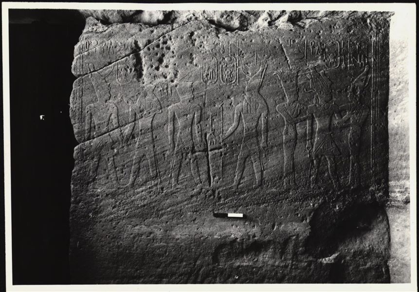 Photograph of an interior wall from the rock-cut chapel of Ellesiya in its original location in Nubia, shortly before the Nile waters would begin to rise due to the construction of the Aswan Dam, which would flood the area. Photograph taken in the mid-1960s, shortly before the rock-cut chapel was moved.