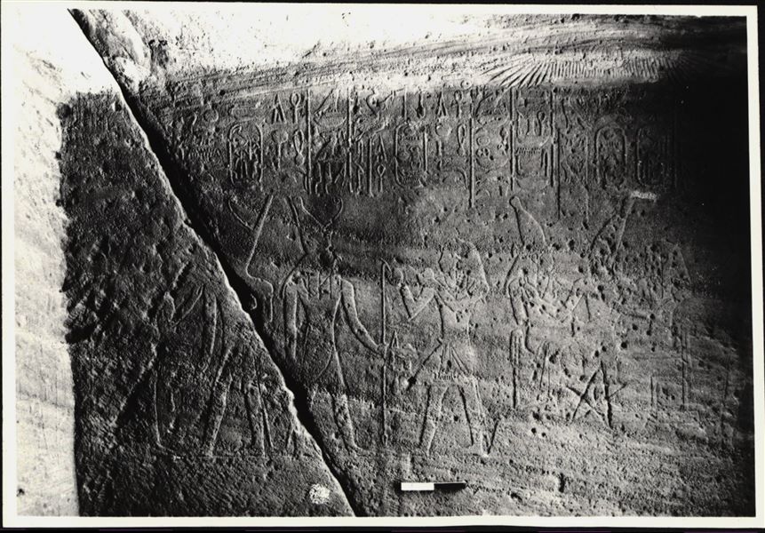 Photograph of a wall from the rock-cut chapel of Ellesiya in its original location in Nubia, shortly before the Nile waters would begin to rise due to the construction of the Aswan Dam, which would flood the area. Photograph taken in the mid-1960s, shortly before the rock-cut chapel was moved.