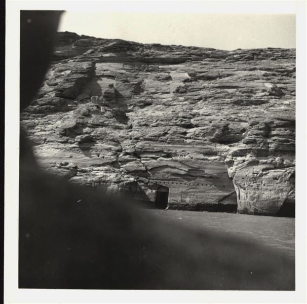 Photograph taken in the direction of the rock-cut rock-cut chapel of Ellesiya that can be seen in the background. In a short time, the rock-cut chapel would have been submerged by the growing Lake Nasser, which had already formed and was quite large. Photograph taken from a boat.