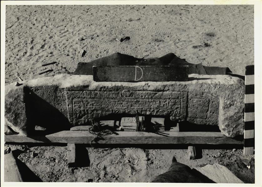 Storage at Wadi es-Sebua, one of the 66 blocks from the rock-cut chapel of Ellesiya stored waiting to be transported to Turin, after the United Arab Republic decided to gift the rock-cut chapel to the Italian Republic. External architrave from the entrance to the antechamber of the rock-cut chapel.