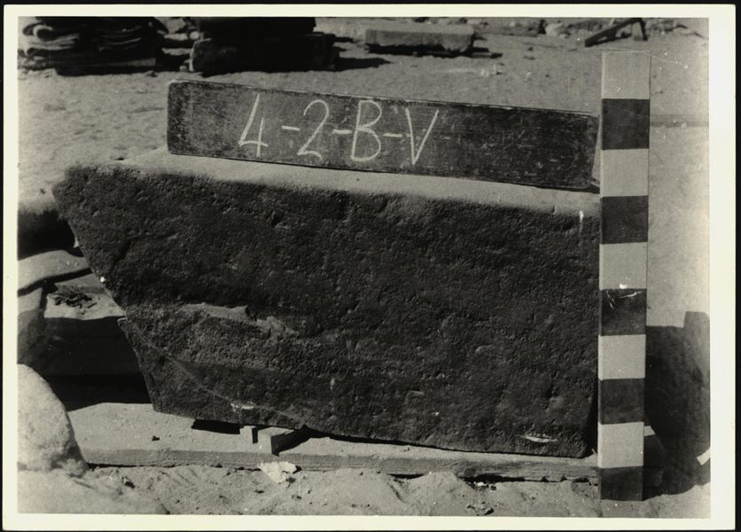 Storage at Wadi es-Sebua, one of the 66 blocks from the rock-cut chapel of Ellesiya stored waiting to be transported to Turin, after the United Arab Republic decided to gift the rock-cut chapel to the Italian Republic. Lower block from the right wall of the transverse hall.