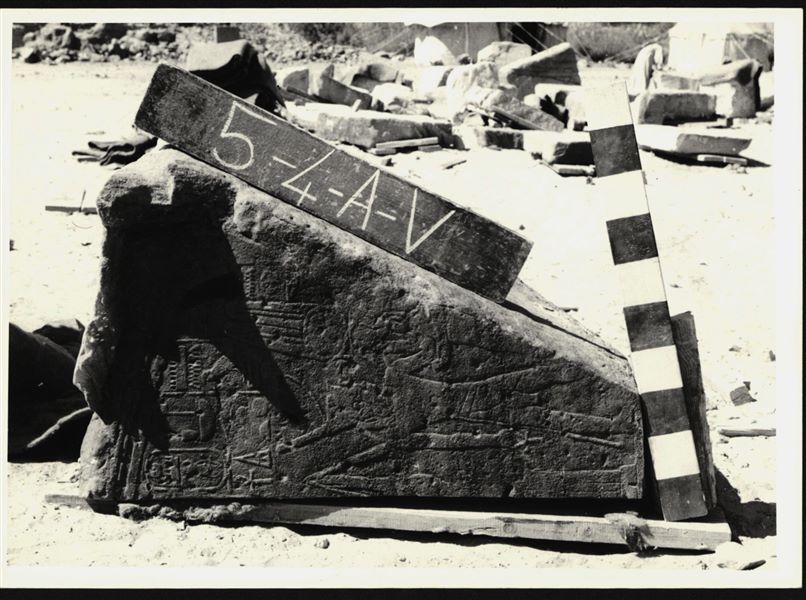 Storage at Wadi es-Sebua, one of the 66 blocks from the rock-cut chapel of Ellesiya stored waiting to be transported to Turin, after the United Arab Republic decided to gift the rock-cut chapel to the Italian Republic. Left wall of the transverse hall, Pharaoh Tuthmosis III (left) and the god Montu (right) are depicted. 