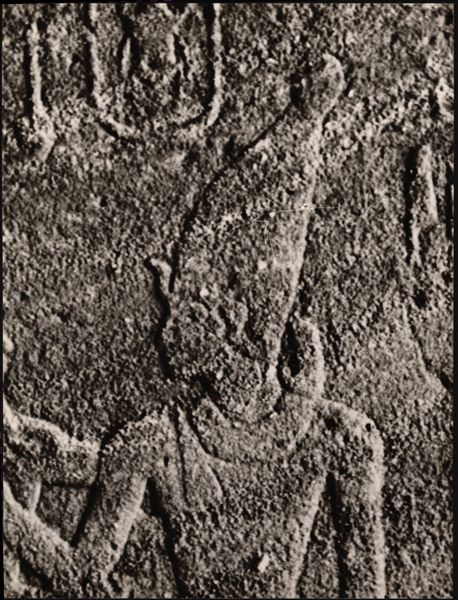 Photograph of a detail depicting Pharaoh Tuthmosis III, from an interior wall in the rock-cut chapel of Ellesiya. The rock-cut chapel is in its original location in Nubia, shortly before the Nile waters would begin to rise due to the construction of the Aswan Dam, which would flood the area. Photograph taken in the mid-1960s, shortly before the rock-cut chapel was moved.