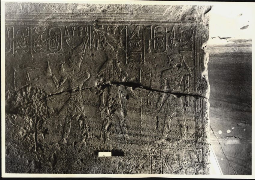 Photograph of a wall from the rock-cut chapel of Ellesiya in its original location in Nubia, shortly before the Nile waters would begin to rise due to the construction of the Aswan Dam, which would flood the area. Photograph taken in the mid-1960s, shortly before the rock-cut chapel was moved.