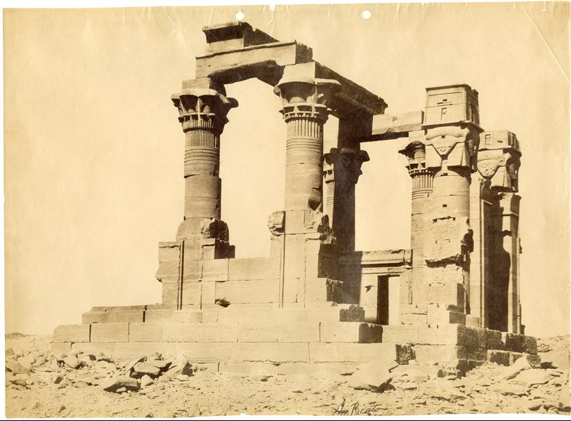 View of the remains of the Roman Period (3rd century AD) kiosk in the Temple of Isis at Qertassi in Nubia. The temple was moved following the construction of the Aswan Dam, and the resulting formation of Lake Nasser, which would have submerged it. The temple was re-erected in 1963 at New Kalabsha, a location on higher ground not far from Aswan. The author's signature is visible at the bottom left. 