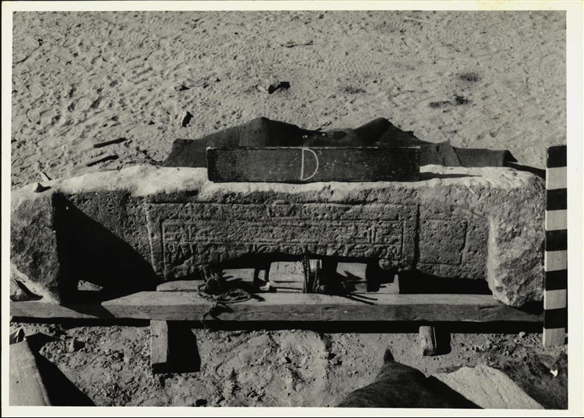 Storage at Wadi es-Sebua, one of the 66 blocks from the Temple of Ellesiya stored waiting to be transported to Turin, after the United Arab Republic decided to gift the temple to the Italian Republic. External architrave from the entrance to the antechamber of the temple.