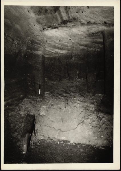 Photograph of the back niche in the Temple of Ellesiya, where the statues (just visible) of deities and the pharaoh were located. The temple is still in its original location in Nubia, shortly before the Nile waters would begin to rise due to the construction of the Aswan Dam, which would flood the area. Photograph taken in the mid-1960s, shortly before the temple was moved. Note the original floor, which was not saved.