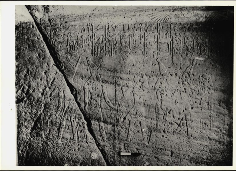 Photograph of an interior section from the Temple of Ellesiya, shortly before it was moved. Photograph taken in the mid-1960s. Scene with several deities, on the right side of the transverse chamber. An engraved five-pointed star is also visible. 