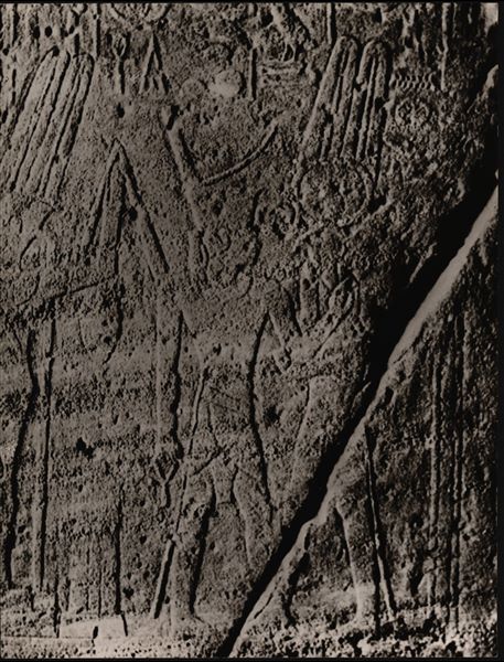 Photograph of a detail depicting Pharaoh Thutmosis III and the god Horus, from an interior wall in the Temple of Ellesiya. The temple is in its original location in Nubia, shortly before the Nile waters would begin to rise due to the construction of the Aswan Dam, which would flood the area. Photograph taken in the mid-1960s, shortly before the temple was moved.