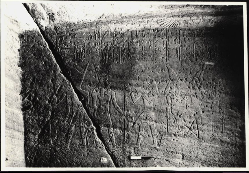 Photograph of a wall from the Temple of Ellesiya in its original location in Nubia, shortly before the Nile waters would begin to rise due to the construction of the Aswan Dam, which would flood the area. Photograph taken in the mid-1960s, shortly before the temple was moved.