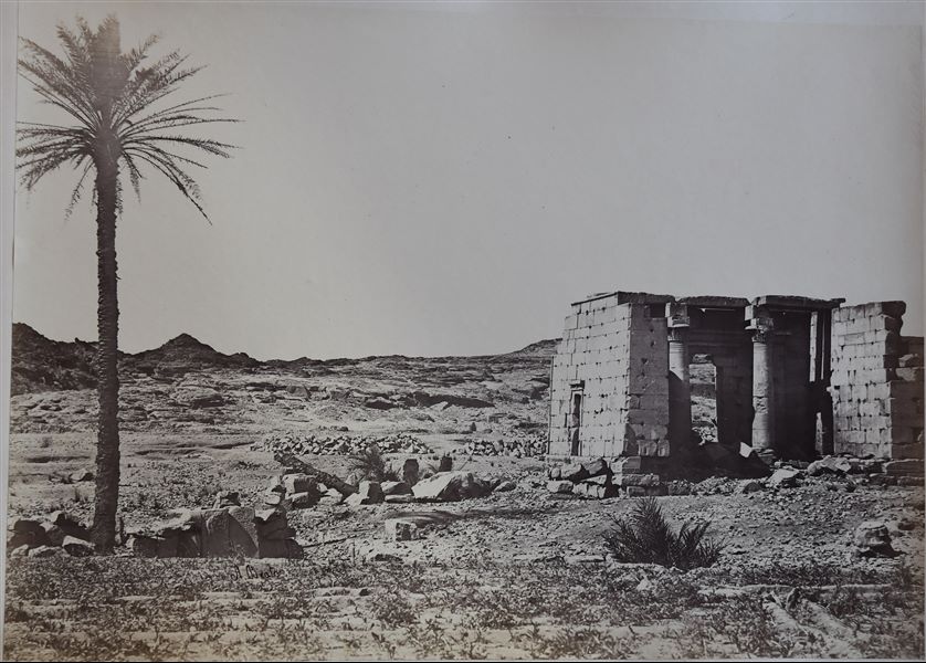 View of the remains of the Temple of Taffeh, built in Nubia in the Roman Period. Due to the temple’s risk of submersion after the construction of the Aswan Dam and the rising Lake Nasser, it was removed in 1960s and then donated by the egyptian government to the Netherlands for their help and assistance in documenting the Nubian territory. It  is now in the Rijksmuseum van Oudheden, Leiden. The author's signature is at the bottom left. 