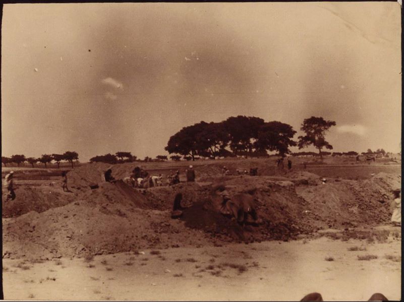 Excavations in the Heliopolis area. Some workmen can be seen excavating some trenches. Schiaparelli excavations.