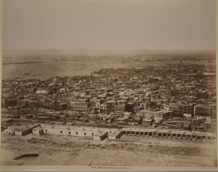 Panorama from the Cairo Citadel. In the background, the silhouettes of the Pyramids of Giza are visible. 