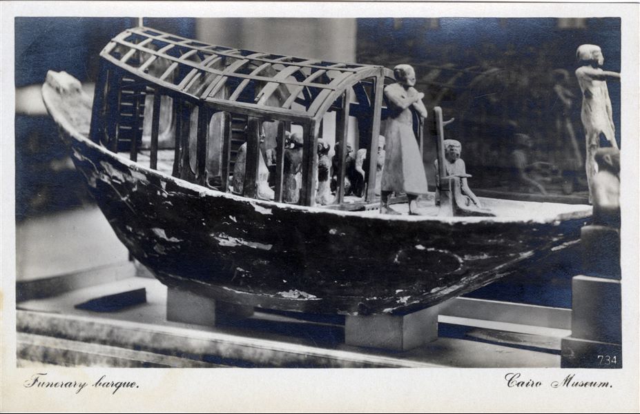 Gallery in the Egyptian Museum in Cairo. Wooden boat model. Album “Cartes postales” (Postcards).